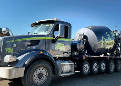 Close-up of Collins Concrete vehicle wrap installation showing clean vinyl application, sharp branding details, and seamless commercial fleet graphics finish.